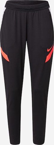 NIKE Slim fit Workout Pants in Black: front
