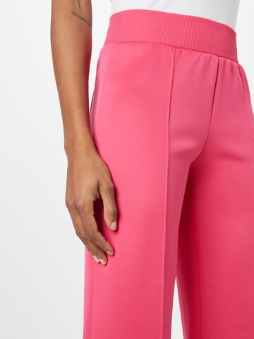 Tapered Pantaloni modello harem di PATRIZIA PEPE in rosa