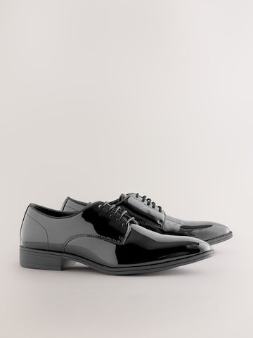 Chaussure à lacets Next en noir