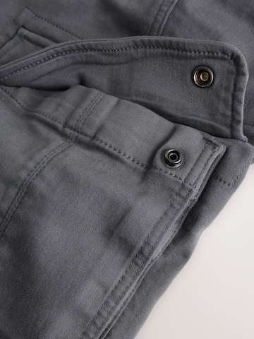 NextSlimfit Cargo hlače 'Motionflex' - siva boja