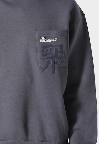 Felpa 'Typo' di Irasuto Studios in blu