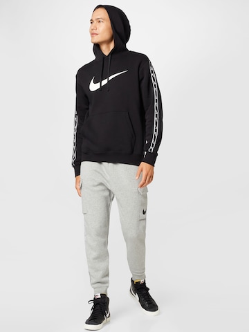 Nike Sportswear Tapered Cargobyxa i grå