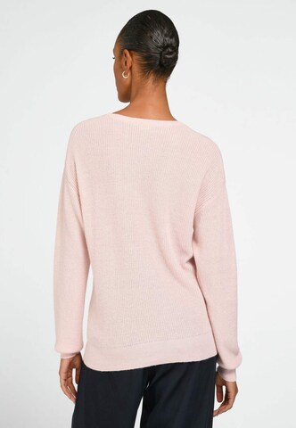 Pull-over include en rouge