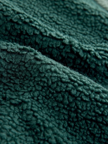 Next Fleecejacka i grön