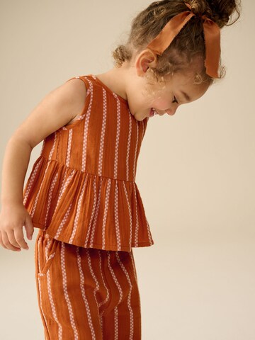 Set Next en orange