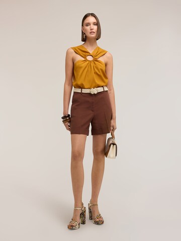 Haut MOTIVI en jaune