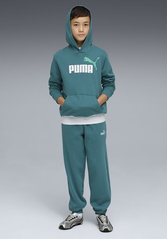 PUMA Tapered Sportbroek in Groen