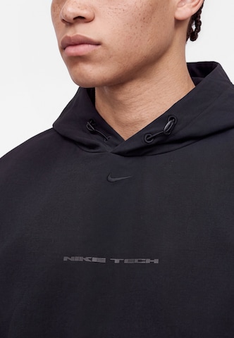 Nike SportswearSweater majica 'NK TCH' - crna boja