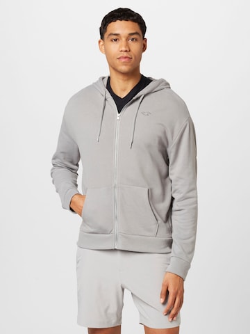 Veste de survêtement HOLLISTER en gris : devant