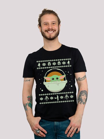 T-Shirt 'Star Wars The Mandalorian The Child Christmas' F4NT4STIC en noir : devant