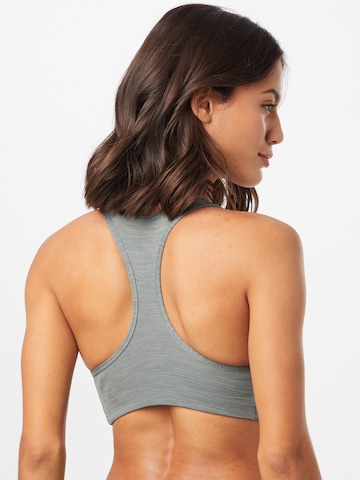 regular Reggiseno sportivo di NIKE in grigio