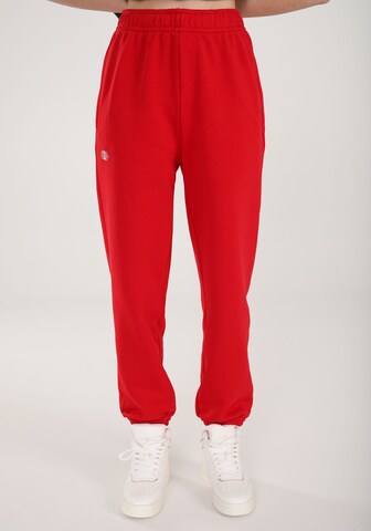 ET Nos Loose fit Workout Pants in Red: front