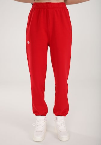 ET Nos Loose fit Workout Pants in Red: front