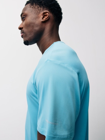 T-Shirt Next en bleu