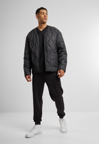 Urban Classics Конический (Tapered) Штаны в Черный