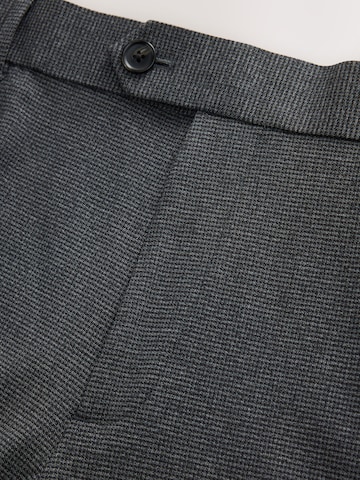 Slimfit Pantaloni con piega frontale di Next in blu