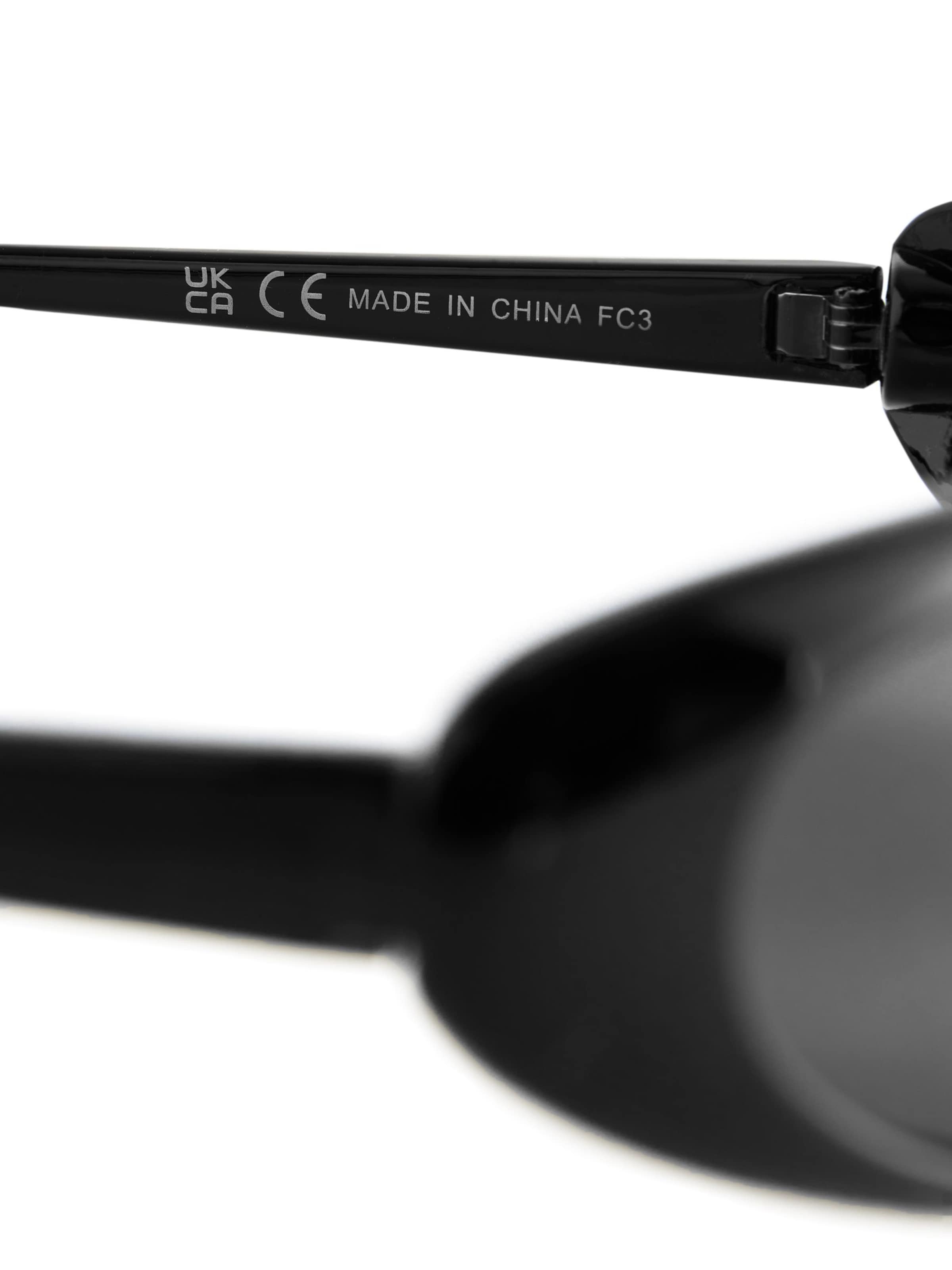 Lunettes de soleil Next en noir