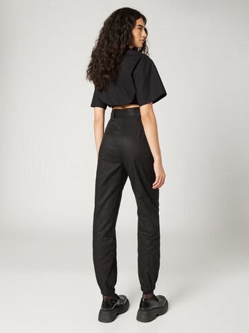 Tapered Pantaloni cutați 'Nova' de la Guido Maria Kretschmer Women pe negru