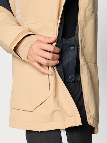 COLUMBIA Sportdzseki 'Coreshot™' - bézs