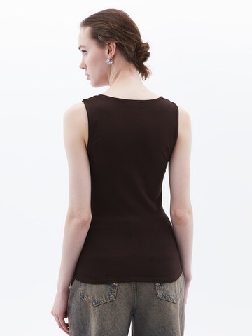 Haut OXXO en marron