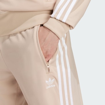 ADIDAS ORIGINALS Štandardný strih Nohavice 'Adicolor Classics Firebird' - Béžová