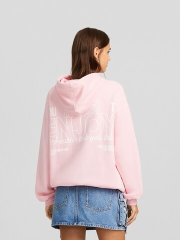 Sweat-shirt Bershka en rose