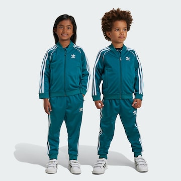 ADIDAS ORIGINALS Костюм для бега 'Adicolor' в Зеленый: спереди