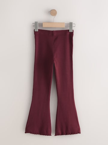 Next - Acampanado Leggings en rojo