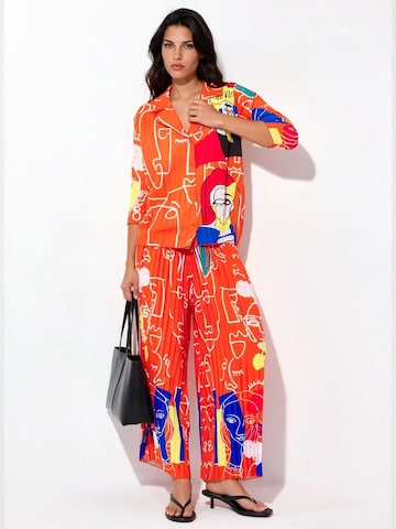 Pantalons de tailleur MSN Collection en orange