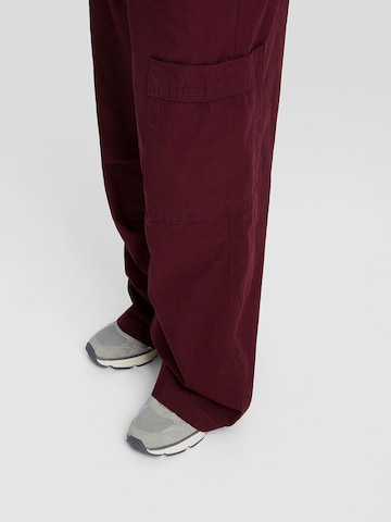 Bershka Wide leg Cargo trousers in Red