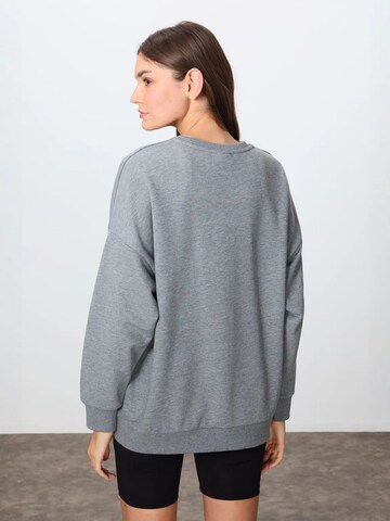 Sweat-shirt Tommy Life en gris