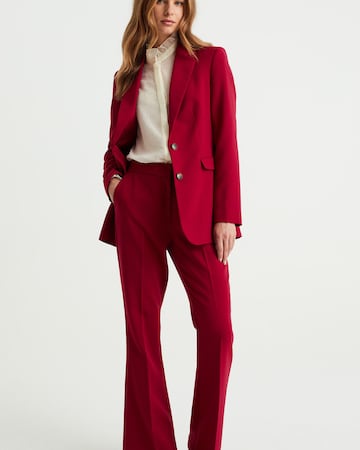 WE Fashion Rozkloszowany krój Spodnie w kant w kolorze czerwony