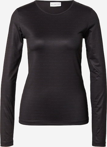 Blanche Skjorte i svart: forside