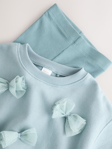 Set Next en bleu
