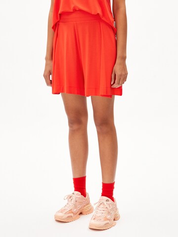 ARMEDANGELS Loose fit Trousers 'AAREZU' in Orange: front