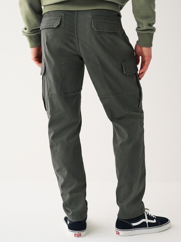 Tapered Pantaloni cargo di Next in grigio