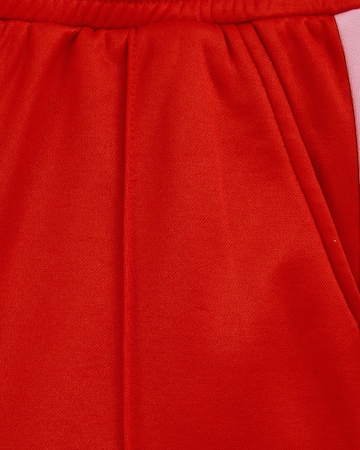 WE Fashion Широка кройка Панталон в червено