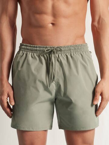 IUMAN Intimissimi Swim Trunks in Green: front