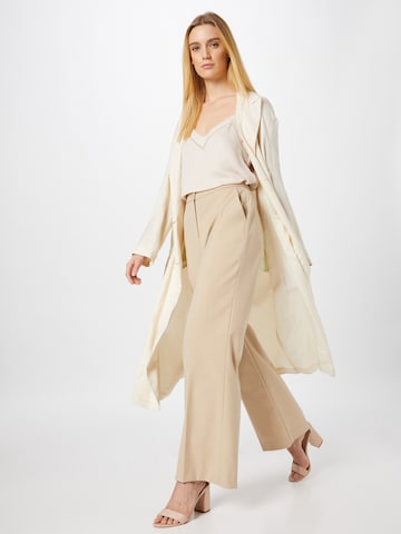 Top 'Nia' di ABOUT YOU in beige