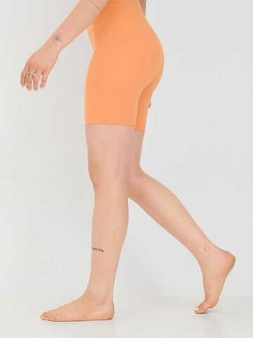 ABOUT YOU x Sofia Tsakiridou Skinny Pants 'Anouk' in Orange