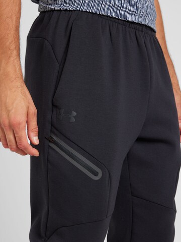 Effilé Pantalon de sport 'Unstoppable' UNDER ARMOUR en noir