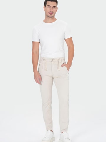 M.O.D MIRACLE OF DENIM - Tapered Vaquero en beige: frente