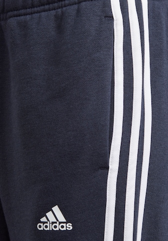 ADIDAS SPORTSWEAR Tapered Παντελόνι φόρμας 'Essentials 3-Stripes' σε μαύρο