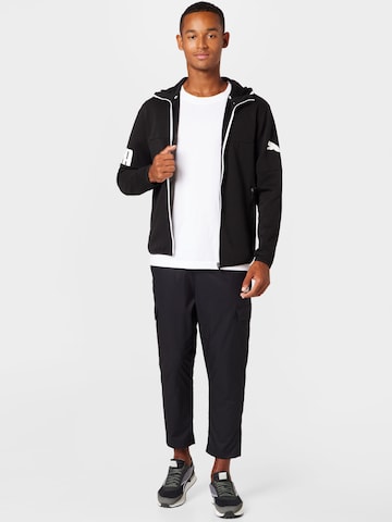 PUMA Regular Sports trousers in Black