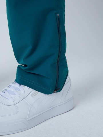 Regular Pantalon de sport SPORTKIND en vert