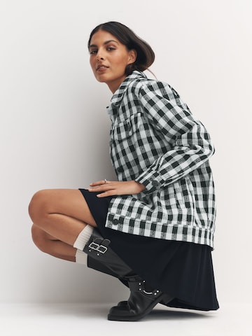 Next Tussenjas in Blauw