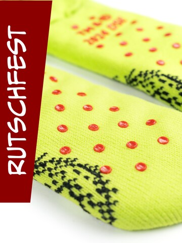 The Grinch Socken 'Hüttensocken Merry Grinchmas'‌‌‌‌‌ in Grün