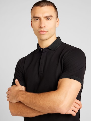 ARMANI EXCHANGE Poloshirt in Schwarz