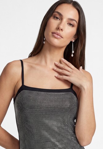 faina - Top en negro
