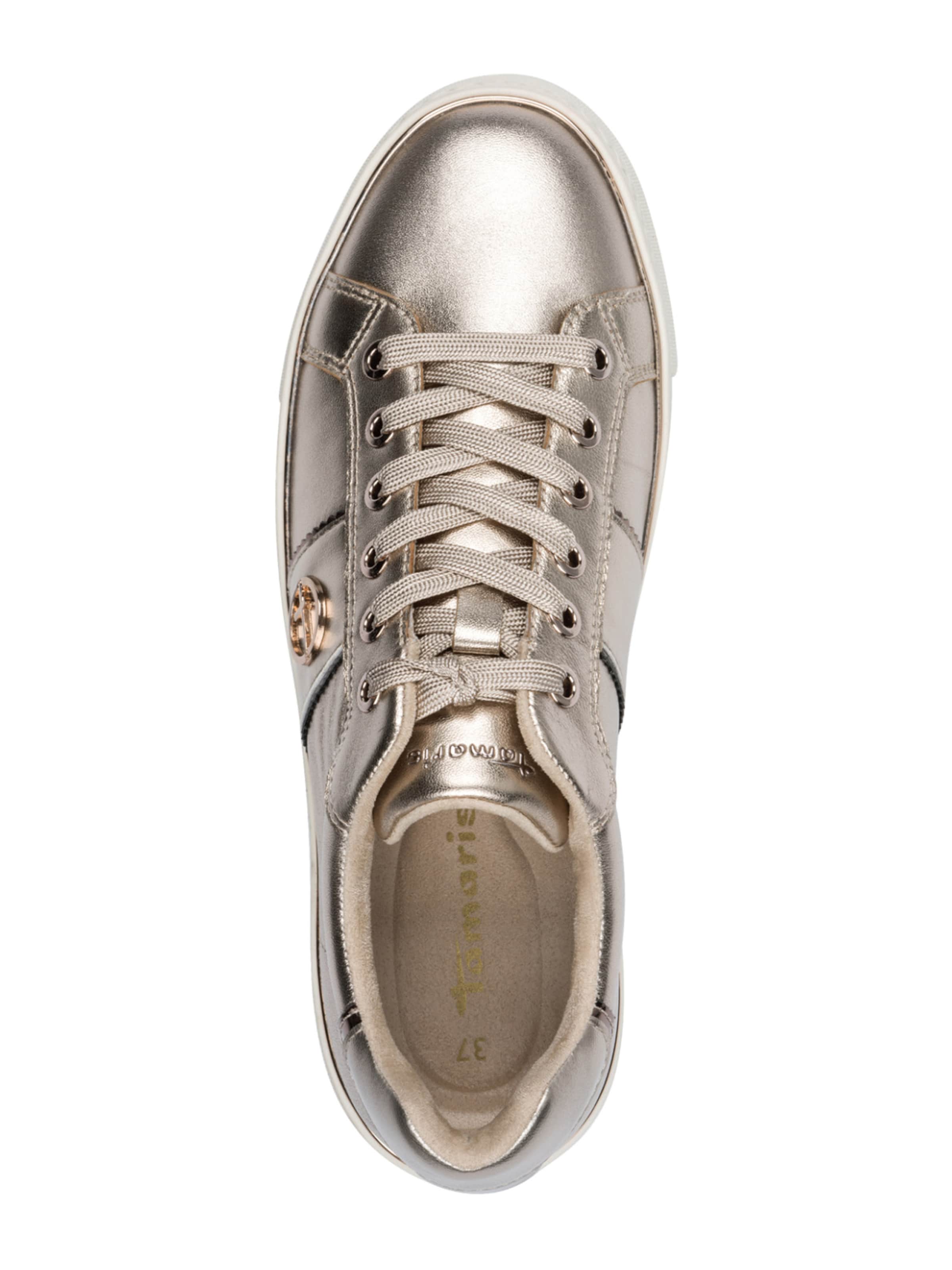 Tamaris Sneaker low i guld